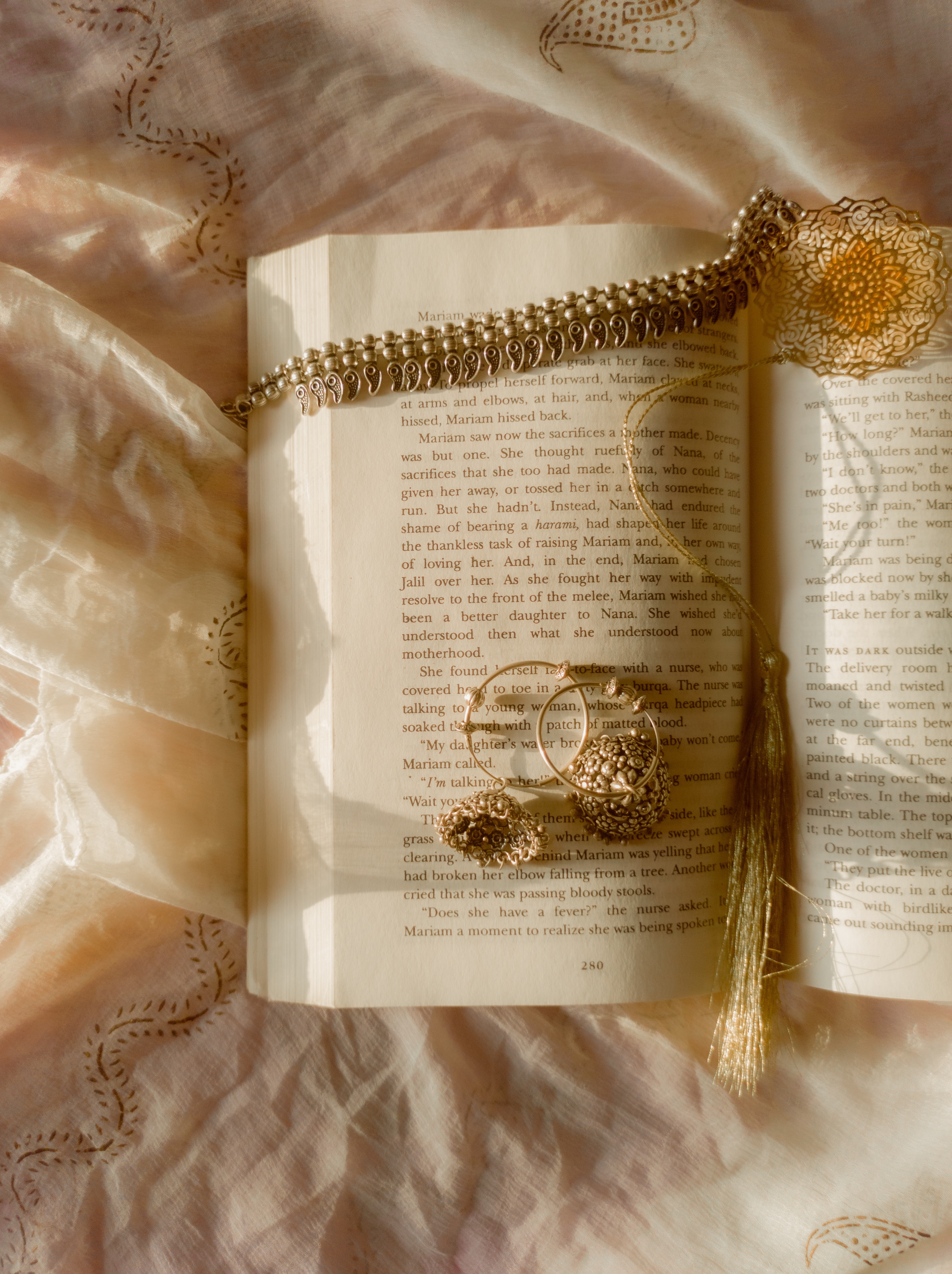book and jewelry
